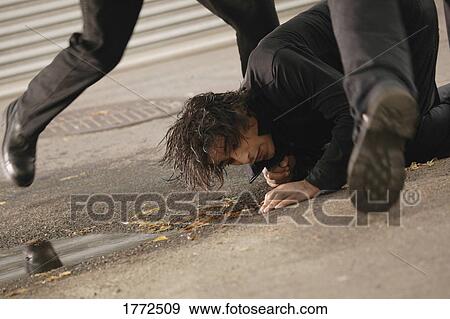 Man on the ground View Large Photo Image Stock Photo - Man on the ground. Fotosearch