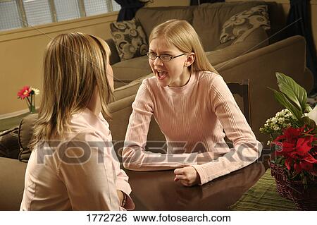 Mother and daughter fighting View Large Photo Image Stock Photograph - Mother and daughter fighting. Fotosearch