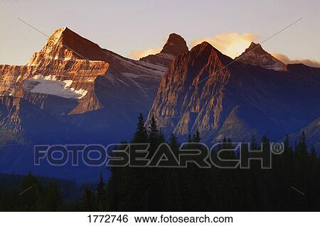 Mountains at sunrise View Large Photo Image Stock Photograph - Mountains at sunrise. Fotosearch
