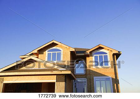 Stock Photo - New house nearly finished. Fotosearch