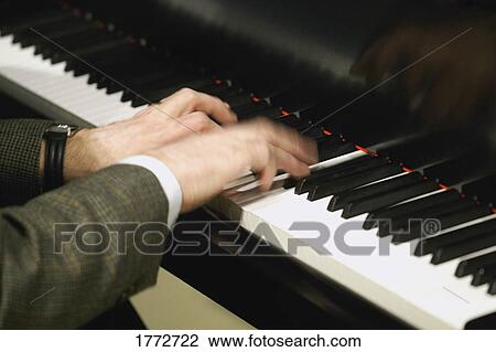 Pianist playing View Large Photo Image Stock Image - Pianist playing. Fotosearch