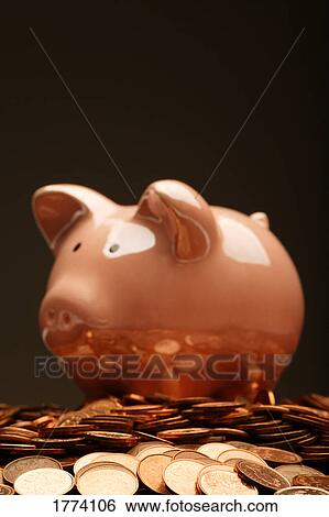 Piggy bank and riches View Large Photo Image Stock Photograph - Piggy bank and riches. Fotosearch