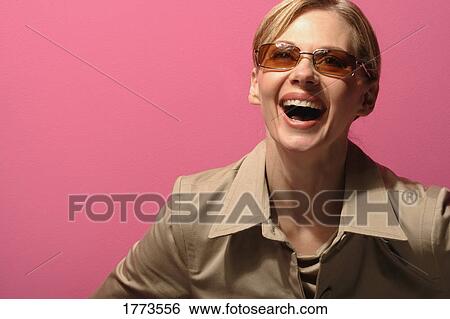 Portrait of attractive woman laughing View Large Photo Image Stock Photograph - Portrait of attractive woman laughing. Fotosearch