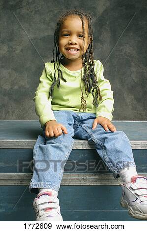 Stock Photo - Portrait of little girl. Fotosearch