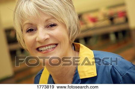 Portrait of smiling adult woman View Large Photo Image Stock Photo - Portrait of smiling adult woman. Fotosearch
