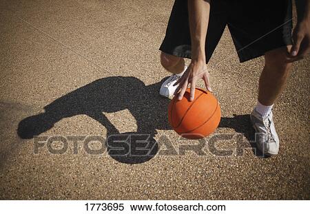 Practicing with basketball View Large Photo Image Stock Photography - Practicing with basketball. Fotosearch