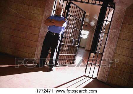 Prison security guard View Large Photo Image Stock Image - Prison security guard. Fotosearch