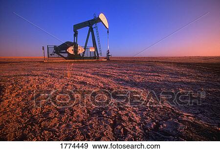 Pumping for oil View Large Photo Image Stock Photo - Pumping for oil. Fotosearch