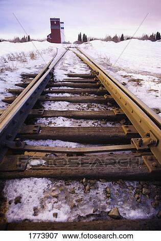 Railway tracks in winter View Large Photo Image Stock Photo - Railway tracks in winter. Fotosearch