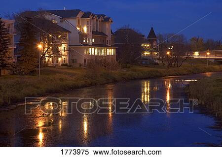 Riverside buildings at night View Large Photo Image Stock Photography - Riverside buildings at night. Fotosearch