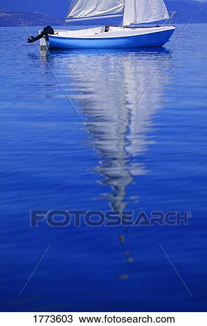 Stock Image - Sailboat on water. Fotosearch