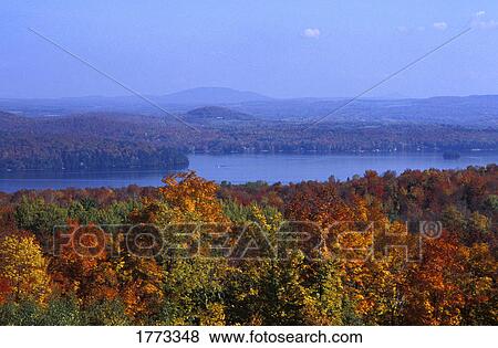 Stock Photo - Scenic landscape with lake. Fotosearch