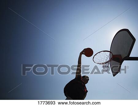 Silhouette of basketball player View Large Photo Image Stock Image - Silhouette of basketball player. Fotosearch