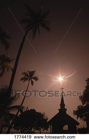 Stock Photo - Silhouette of tropical church. Fotosearch