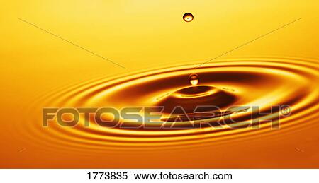 Split second drop of liquid View Large Photo Image Stock Photography - Split second drop of liquid. Fotosearch