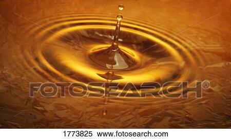 Stock Photography - Split second droplet. Fotosearch