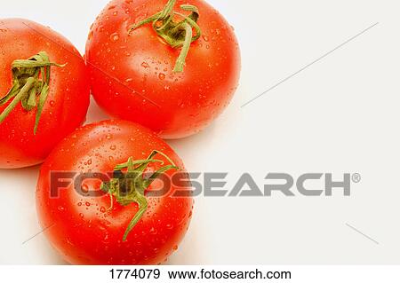 Three ripe tomatoes View Large Photo Image Stock Photo - Three ripe tomatoes. Fotosearch