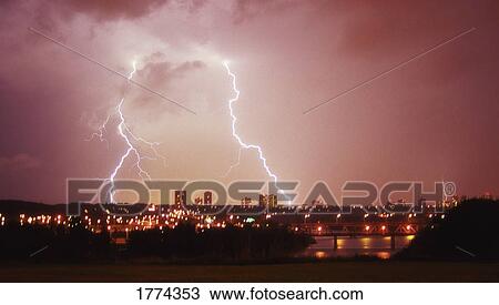 Thunder and lighting over the skyline View Large Photo Image Stock Image - Thunder and lighting over the skyline. Fotosearch