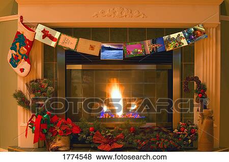Stock Photo - Traditional Christmas fireplace. Fotosearch