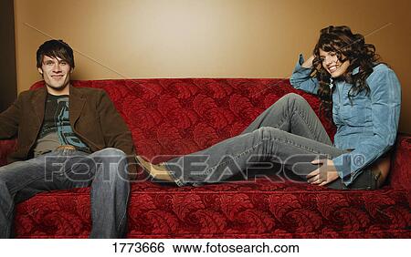 Trendy couple hanging out View Large Photo Image Stock Photograph - Trendy couple hanging out. Fotosearch