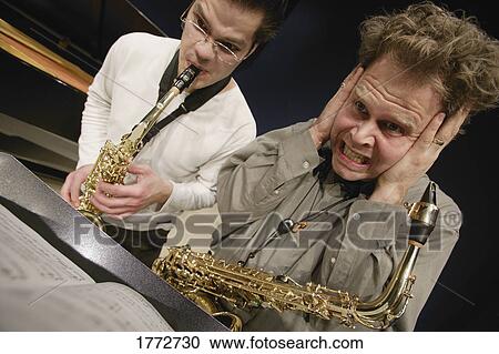 Two saxophonists View Large Photo Image Stock Image - Two saxophonists. Fotosearch