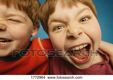 Picture - Two young friends having a blast. Fotosearch