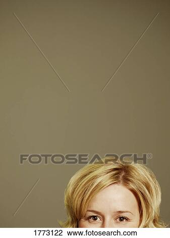 Upper half of a female face View Large Photo Image Stock Image - Upper half of a female face. Fotosearch