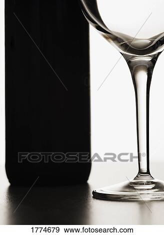 Wine glass and bottle View Large Photo Image Stock Photo - Wine glass and bottle. Fotosearch