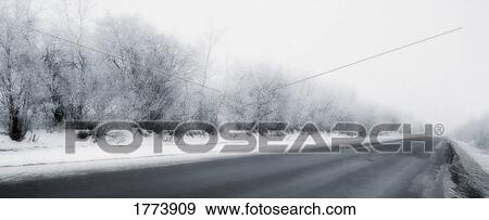 Wintry road View Large Photo Image Stock Photo - Wintry road. Fotosearch