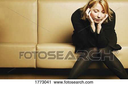 Woman bored with waiting View Large Photo Image Stock Image - Woman bored with waiting. Fotosearch