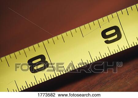 Yellow and black tape measure View Large Photo Image Stock Image - Yellow and black tape measure. Fotosearch