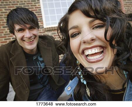 Young attractive couple View Large Photo Image Stock Photo - Young attractive couple. Fotosearch