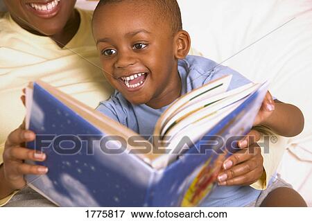 A bedtime story View Large Photo Image Stock Photo - A bedtime story. Fotosearch