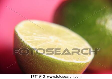 Stock Image - A lime cut in half. Fotosearch