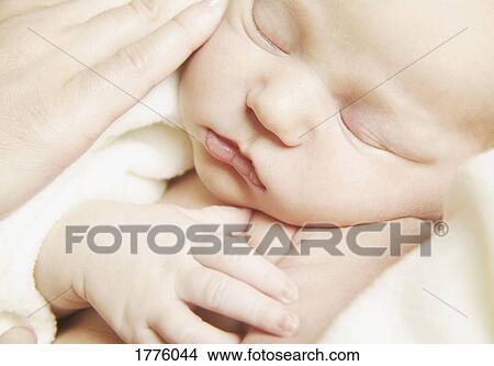 A mother's touch View Large Photo Image Picture - A mother's touch. Fotosearch