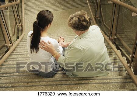 Stock Photo - A reassuring hand. Fotosearch