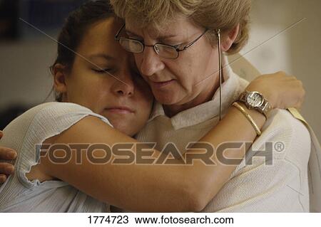 Stock Image - A supportive hug. Fotosearch