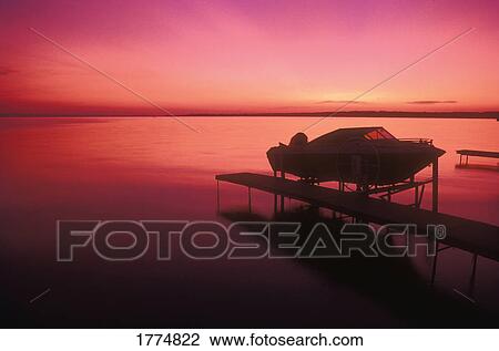 Boat and sunset View Large Photo Image Stock Image - Boat and sunset. Fotosearch