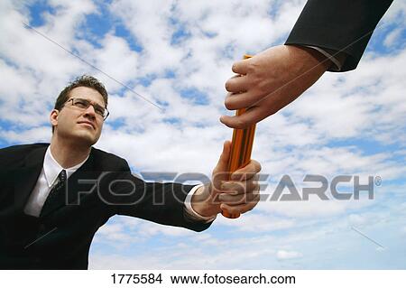 Picture - Businessmen's relay race. Fotosearch