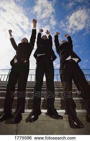 Stock Photograph - Cheering businessman. Fotosearch