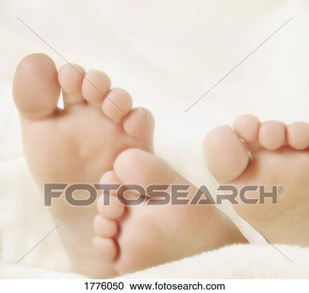 Stock Image - Children's feet. Fotosearch