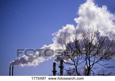 Chimney stacks and smoke View Large Photo Image Stock Photo - Chimney stacks and smoke. Fotosearch