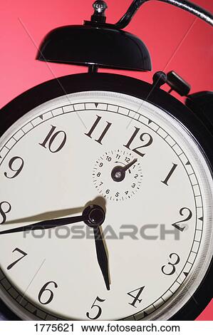Close up of an old fashioned clock View Large Photo Image Stock Image - Close up of an old fashioned clock. Fotosearch