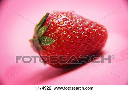 Stock Image - Close up of ripe strawberry. Fotosearch