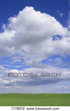 Clouds over field View Large Photo Image Stock Image - Clouds over field. Fotosearch
