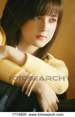 Contemplative teenage girl View Large Photo Image Stock Photograph - Contemplative teenage girl. Fotosearch