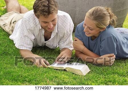 Couple reading View Large Photo Image Stock Photo - Couple reading. Fotosearch