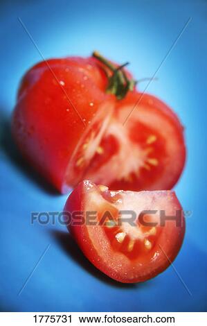 Stock Image - Cut tomato. Fotosearch