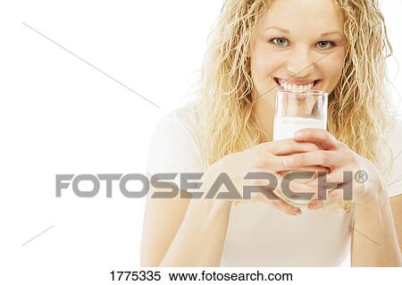 Drinking a glass of milk View Large Photo Image Stock Photography - Drinking a glass of milk. Fotosearch