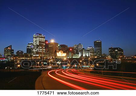 Stock Image - Edmonton skyline with lights on road. Fotosearch